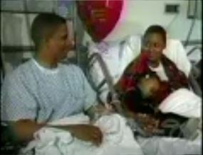 Pastor and Lady Michael with Zoe the day after the transplant surgery (Feb 2001)